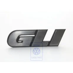 165 853 679 F GX2 : emblem - Schriftzug "GLI"